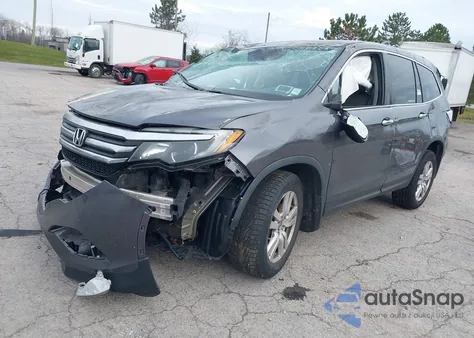 2018 Honda Pilot Lx z USA, uszkodzony, nr VIN 5FNYF6H17JB066016